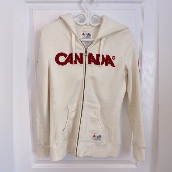 Official 2010 Roots hoodie is cream - S - Picture 1 of 3